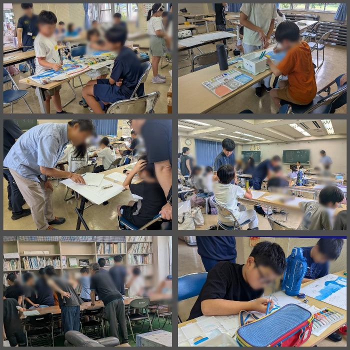ポスター作りに励む小学生とそれを助ける中学生スタッフ