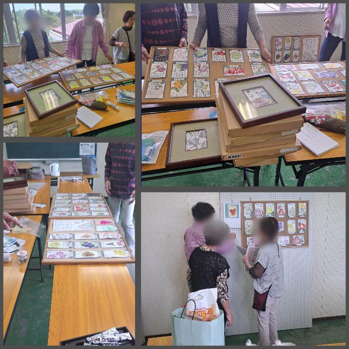 どうやったら見やすくきれいに掲示できるだろうか?頭を悩ます絵手紙サークルの皆さん