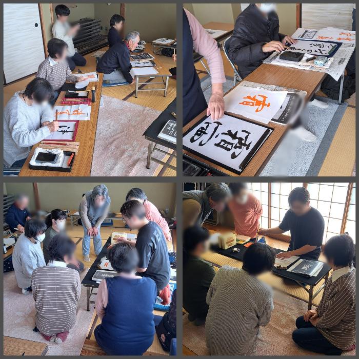 大人の書道教室にて熱心に話を聞き筆を進める皆さん。